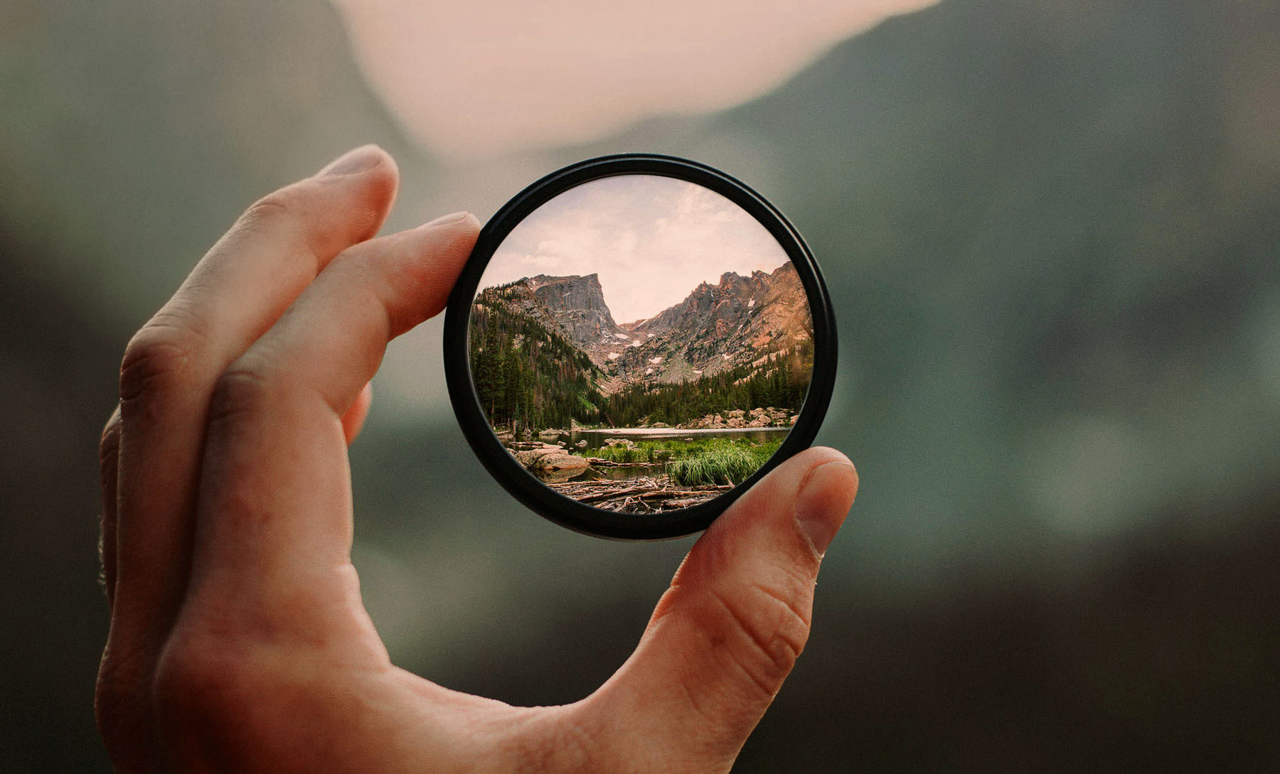 moutainside viewed through a hand held camera lense